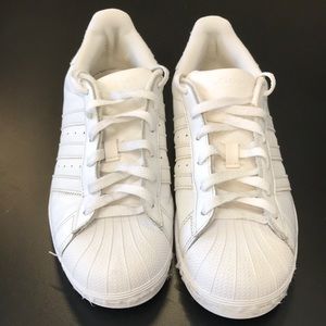 White Superstar tennis shoes